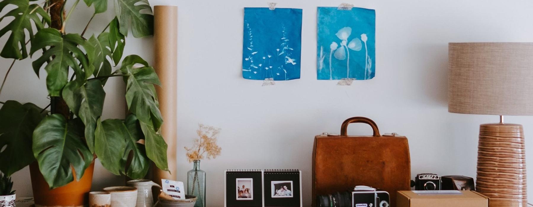 large dresser with a variety of decor on it